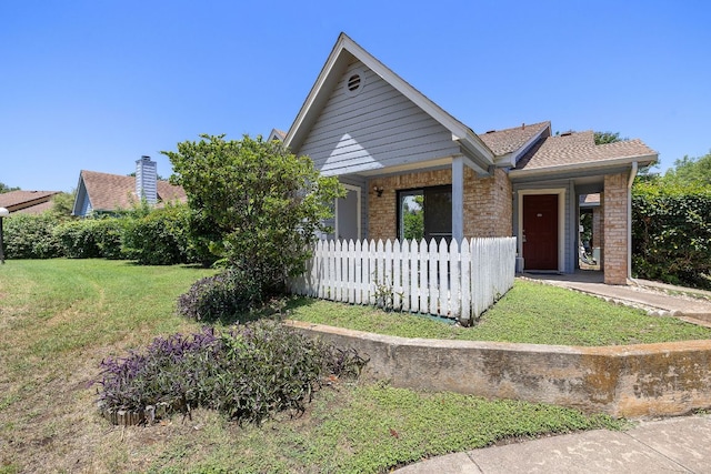1601 Faro Dr Unit 303, Austin, TX 78741 - ranch-style house with brick siding and roof with shingles