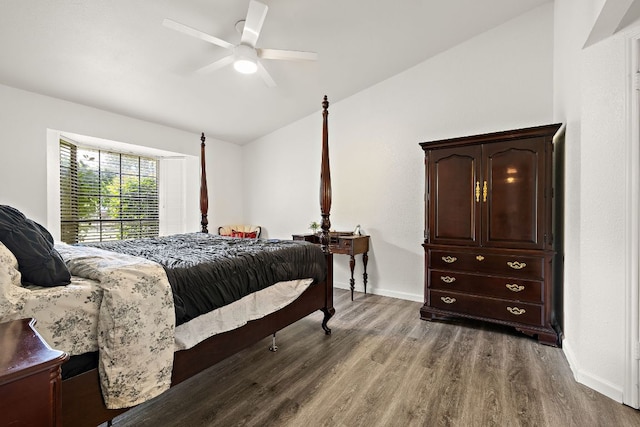 1601 Faro Dr Unit 303, Austin, TX 78741 - bedroom with wood finished floors, vaulted ceiling, baseboards, and a ceiling fan