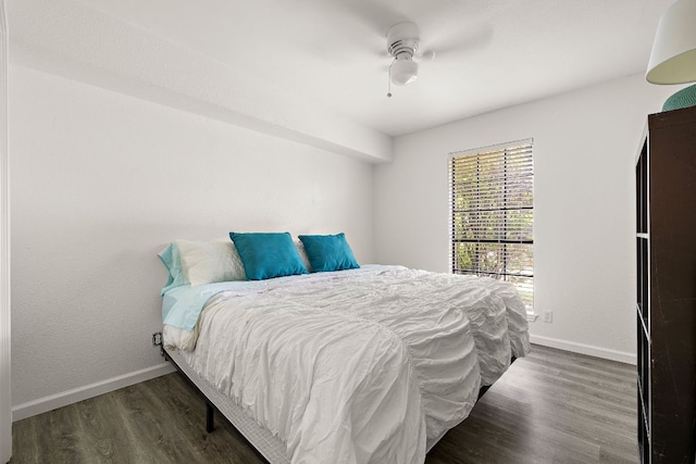 1601 Faro Dr Unit 303, Austin, TX 78741 - bedroom featuring baseboards, wood finished floors, and ceiling fan