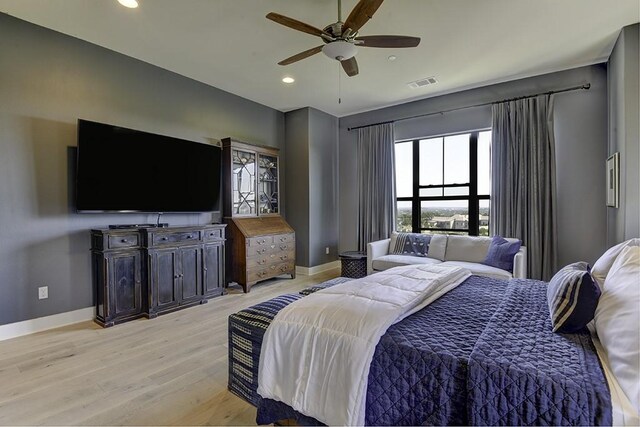 8200 SW Pkwy Unit 721, Austin, TX 78735 - bedroom with multiple windows, light wood finished floors, recessed lighting, baseboards, and ceiling fan