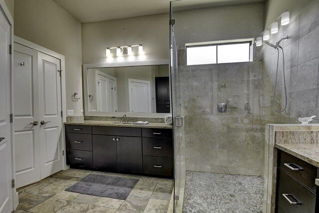 8200 SW Pkwy Unit 721, Austin, TX 78735 - bathroom featuring a shower stall and vanity