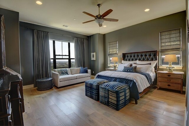 8200 SW Pkwy Unit 721, Austin, TX 78735 - bedroom featuring wood-type flooring, recessed lighting, baseboards, and a ceiling fan