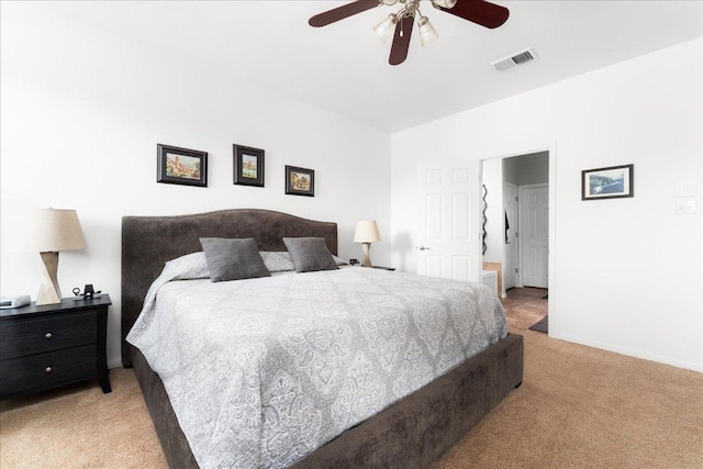 141 Wildcat Draw Dr, Buda, TX 78610 - bedroom featuring light colored carpet, baseboards, and a ceiling fan