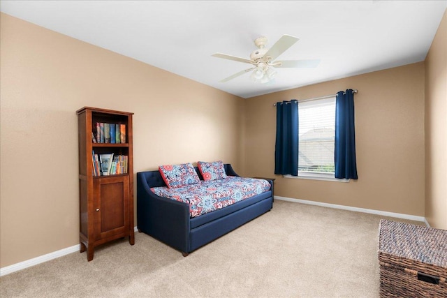 141 Wildcat Draw Dr, Buda, TX 78610 - bedroom with light colored carpet, baseboards, and ceiling fan