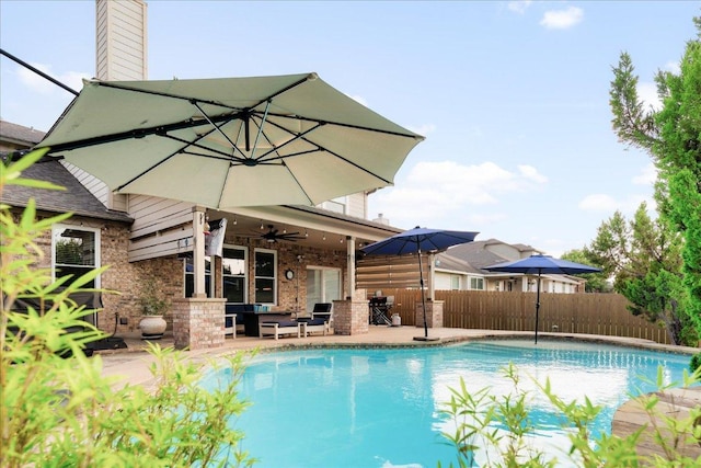 141 Wildcat Draw Dr, Buda, TX 78610 - view of pool featuring a ceiling fan, a patio area, and an outdoor living space