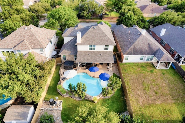 141 Wildcat Draw Dr, Buda, TX 78610 - aerial view of residential area with a pool area
