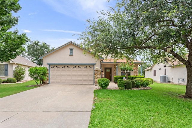 131 Nolan Dr, Georgetown, TX 78633 - view of front facade featuring central air condition unit, stone siding, stucco siding, an attached garage, and a front yard