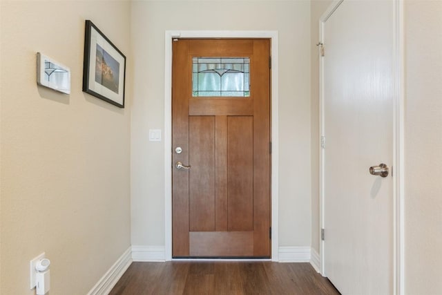 131 Nolan Dr, Georgetown, TX 78633 - foyer with dark wood-type flooring and baseboards