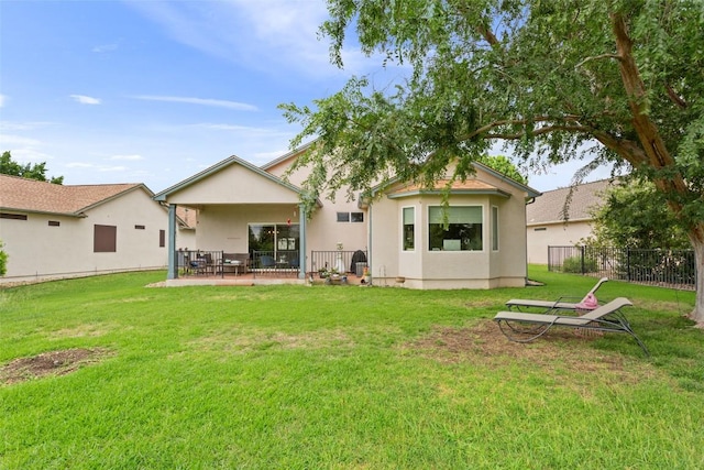 131 Nolan Dr, Georgetown, TX 78633 - rear view of property with a patio and stucco siding