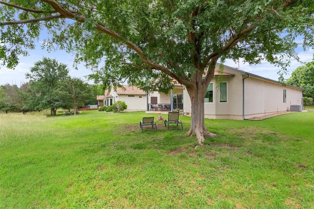 131 Nolan Dr, Georgetown, TX 78633 - view of grassy yard featuring central AC