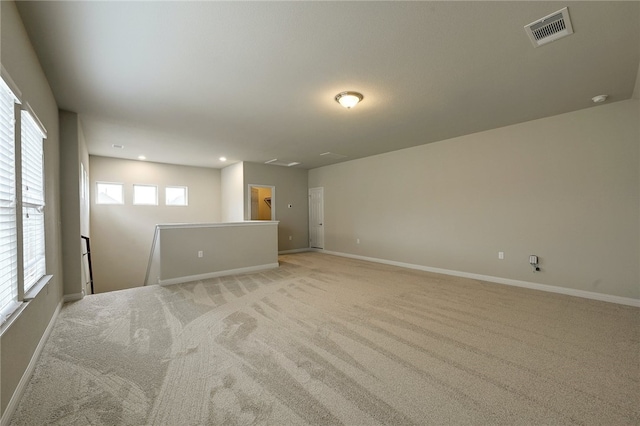 14925 Via Del Corso Dr, Austin, TX 78738 - empty room featuring light carpet, baseboards, and recessed lighting