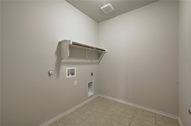 14925 Via Del Corso Dr, Austin, TX 78738 - laundry area with baseboards, gas dryer hookup, washer hookup, hookup for an electric dryer, and light tile patterned floors