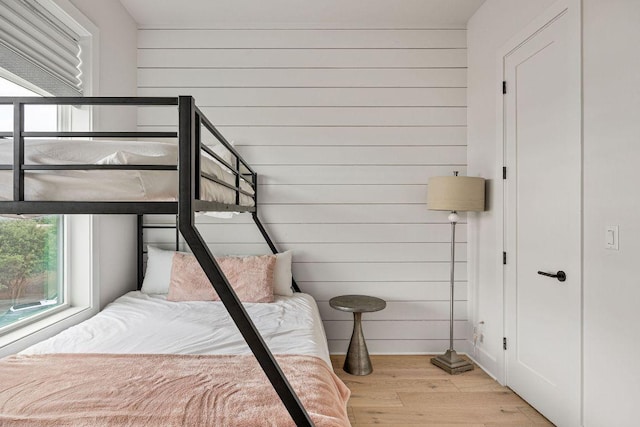 13410 Galleria Cir, Austin, TX 78738 - bedroom featuring wood finished floors and wood walls
