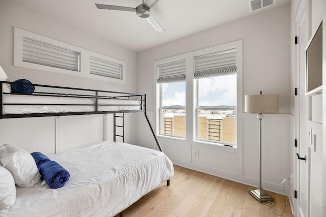 13410 Galleria Cir, Austin, TX 78738 - bedroom featuring light wood-style floors and a ceiling fan