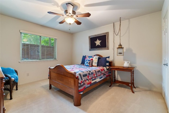 3109 Sesbania Dr, Austin, TX 78748 - bedroom featuring light carpet, ceiling fan, and baseboards