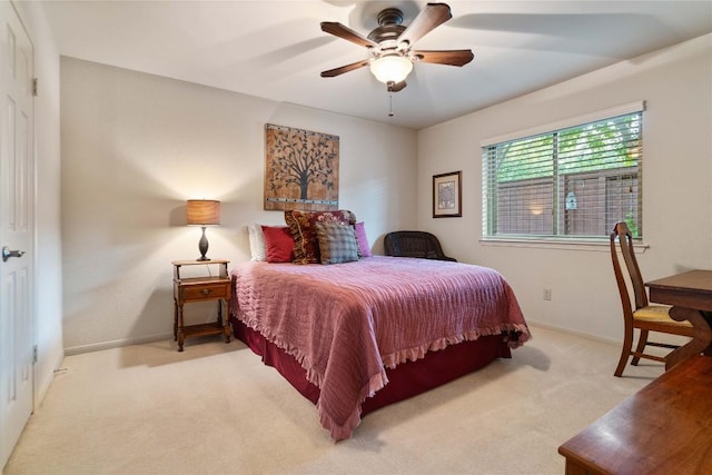 3109 Sesbania Dr, Austin, TX 78748 - bedroom with light carpet, baseboards, and ceiling fan