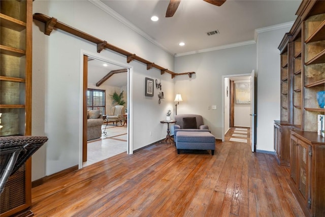 3109 Sesbania Dr, Austin, TX 78748 - sitting room with wood-type flooring, a ceiling fan, recessed lighting, crown molding, and baseboards