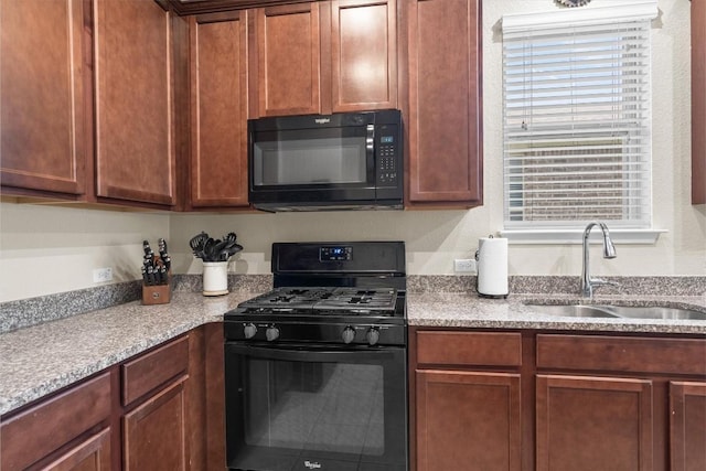1608 Torre St, Leander, TX 78641 - kitchen featuring black appliances and a sink