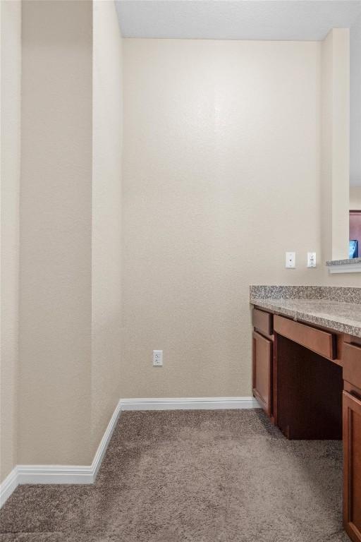 1608 Torre St, Leander, TX 78641 - bathroom with vanity and baseboards