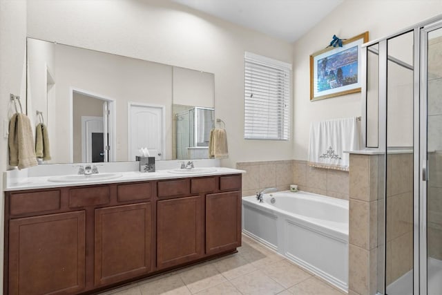 1608 Torre St, Leander, TX 78641 - full bathroom featuring a shower stall, a bath, double vanity, and tile patterned floors
