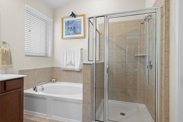 1608 Torre St, Leander, TX 78641 - bathroom featuring a bath, a stall shower, and vanity