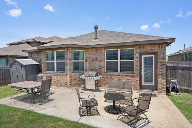1608 Torre St, Leander, TX 78641 - view of patio / terrace featuring a storage unit and grilling area