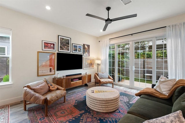 4605 Englewood Dr Unit A, Austin, TX 78745 - living room featuring a ceiling fan, wood finished floors, and recessed lighting