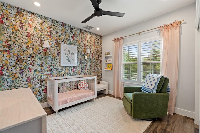 4605 Englewood Dr Unit A, Austin, TX 78745 - living area with wallpapered walls, a ceiling fan, wood finished floors, and recessed lighting