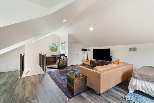 4605 Englewood Dr Unit A, Austin, TX 78745 - living area featuring wood finished floors, lofted ceiling, and recessed lighting