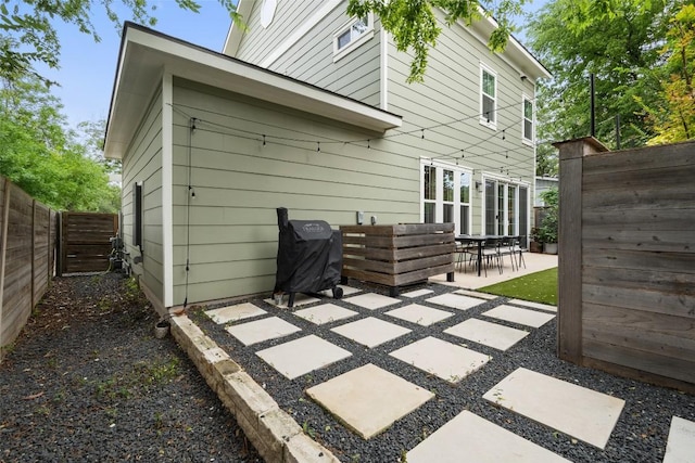 4605 Englewood Dr Unit A, Austin, TX 78745 - rear view of property with a patio and a fenced backyard