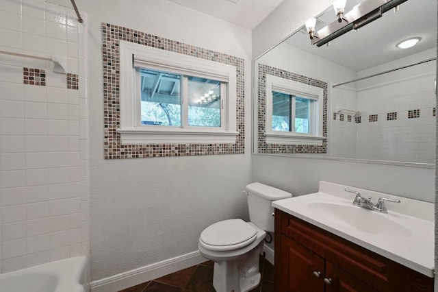 2109 W 10th St, Austin, TX 78703 - bathroom featuring healthy amount of natural light, vanity, shower / bath combination, and tile patterned floors