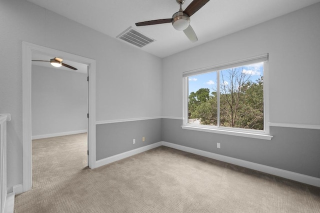 2109 W 10th St, Austin, TX 78703 - carpeted empty room with a ceiling fan and baseboards