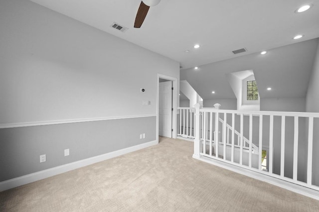 2109 W 10th St, Austin, TX 78703 - empty room with a ceiling fan, carpet flooring, recessed lighting, and vaulted ceiling