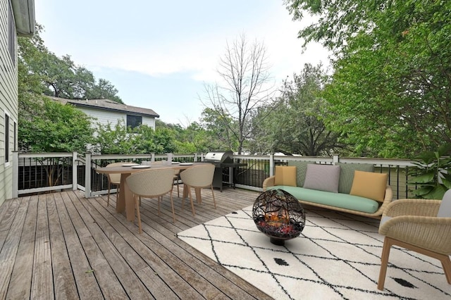 2109 W 10th St, Austin, TX 78703 - deck featuring a grill, a fire pit, and outdoor dining space
