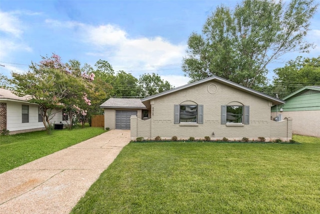 8409 Kimble Cv, Austin, TX 78757 - single story home with concrete driveway, brick siding, a front lawn, and a garage
