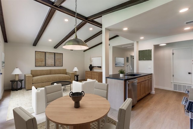 8409 Kimble Cv, Austin, TX 78757 - dining area featuring light wood-style floors, recessed lighting, and baseboards