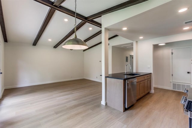8409 Kimble Cv, Austin, TX 78757 - kitchen with stainless steel dishwasher, a sink, light wood-style floors, dark countertops, and baseboards
