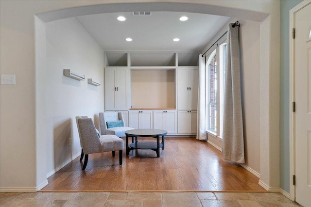 1509 Foster Dr, Cedar Park, TX 78613 - sitting room with arched walkways, baseboards, plenty of natural light, and recessed lighting