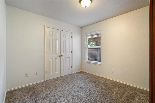 1509 Foster Dr, Cedar Park, TX 78613 - unfurnished bedroom with carpet and a closet