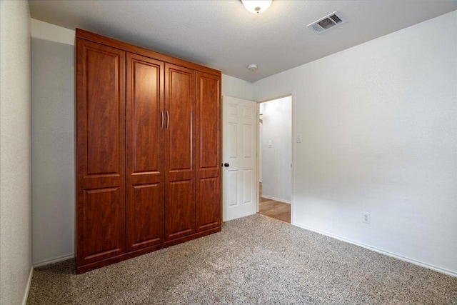 1509 Foster Dr, Cedar Park, TX 78613 - unfurnished bedroom with carpet and baseboards
