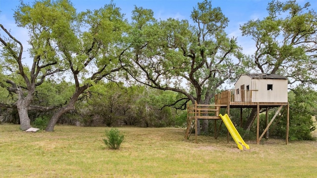 321 Hannah Dr, Dripping Springs, TX 78620 - view of green lawn featuring a playground