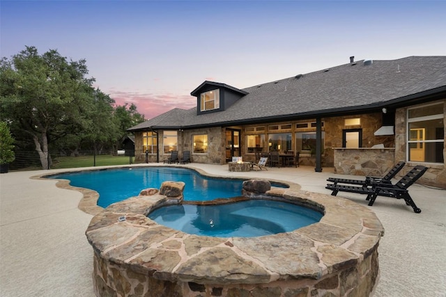 321 Hannah Dr, Dripping Springs, TX 78620 - view of swimming pool with a patio area and a pool with connected hot tub