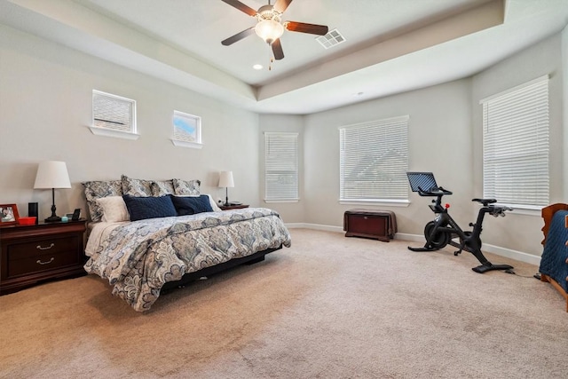 1005 Hezekiah Ln, Leander, TX 78641 - carpeted bedroom featuring ceiling fan and a raised ceiling
