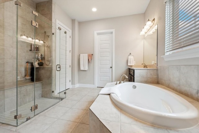1005 Hezekiah Ln, Leander, TX 78641 - full bath with a bath, a shower stall, tile patterned flooring, and vanity