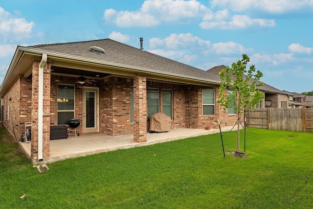 1005 Hezekiah Ln, Leander, TX 78641 - rear view of property with ceiling fan, brick siding, a patio, and a shingled roof