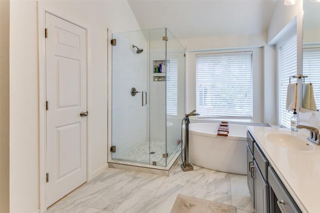 13532 Utah Flats Dr, Austin, TX 78727 - bathroom featuring vanity, a shower stall, a freestanding tub, and plenty of natural light