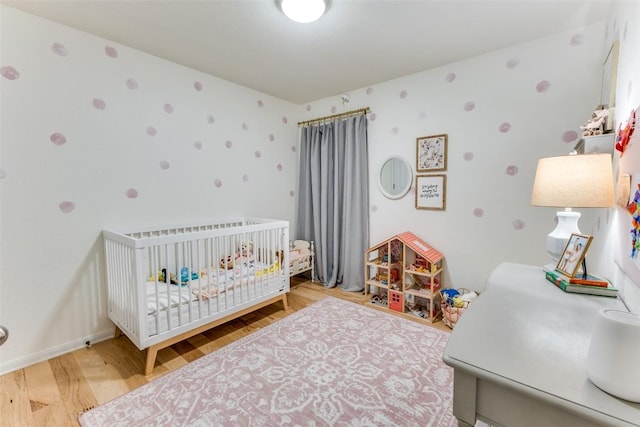 13532 Utah Flats Dr, Austin, TX 78727 - bedroom with wood finished floors and a nursery area