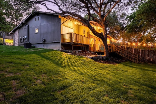 907 The High Rd, Austin, TX 78746 - rear view of property with a deck and central AC unit