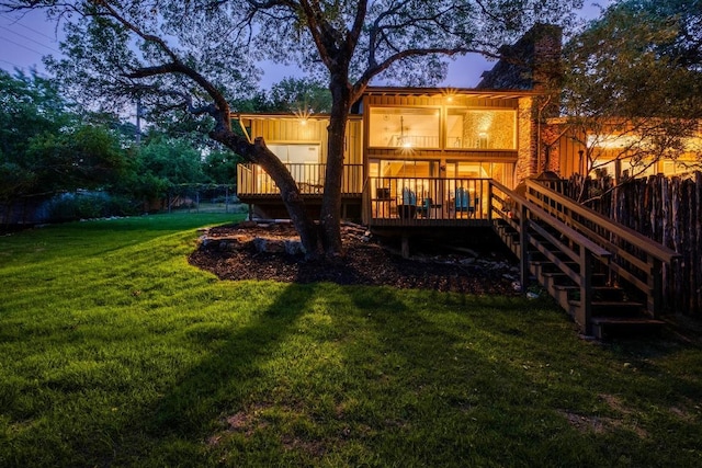 907 The High Rd, Austin, TX 78746 - back of house featuring stairway, a deck, and a yard