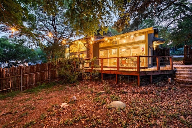 907 The High Rd, Austin, TX 78746 - rear view of property featuring a wooden deck